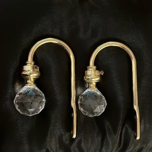 Lucite, metal and plastic “crystal ball” curtain tie backs